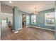 Dining room with hardwood floors and kitchen access at 9761 Transplanter Cir, Ladson, SC 29456