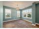 Dining room with hardwood floors and light blue walls at 9761 Transplanter Cir, Ladson, SC 29456