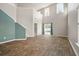 Spacious living room with high ceilings and hardwood floors at 9761 Transplanter Cir, Ladson, SC 29456