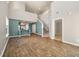 Open living area showcasing high ceilings and hardwood floors at 9761 Transplanter Cir, Ladson, SC 29456