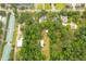 Aerial view of a property with various buildings and trees at 1225 Central Ave, Summerville, SC 29483