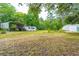 Spacious lot with RV carport, storage shed, and mature trees at 1225 Central Ave, Summerville, SC 29483