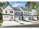 New townhomes featuring various exterior colors and attached garages at 1077 Crescent Cove Ln, Summerville, SC 29483