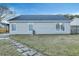 Backyard with stone path and wooden fence at 124 Pointer Dr, Goose Creek, SC 29445
