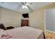 Cozy bedroom with a dresser, TV, and ceiling fan at 124 Pointer Dr, Goose Creek, SC 29445