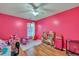 Bright bedroom with pink walls and hardwood floors at 124 Pointer Dr, Goose Creek, SC 29445