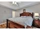 Bright bedroom features hardwood floors and a ceiling fan at 124 Pointer Dr, Goose Creek, SC 29445