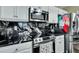 Kitchen boasts granite countertops and stainless steel appliances at 124 Pointer Dr, Goose Creek, SC 29445