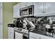 Stainless steel appliances and granite countertops highlight this kitchen at 124 Pointer Dr, Goose Creek, SC 29445