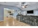 Open living area with sectional sofa and kitchen at 124 Pointer Dr, Goose Creek, SC 29445