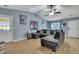 L-shaped sectional sofa in living room with hardwood floor at 124 Pointer Dr, Goose Creek, SC 29445