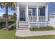 Inviting front porch with wooden steps and white columns at 1251 Weather Helm Dr, Mount Pleasant, SC 29466