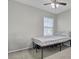 Bright bedroom with a double bed and ceiling fan at 128 Buchanan Cir, Goose Creek, SC 29445