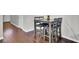 Small dining space with a table and four chairs. Hardwood floors throughout at 128 Buchanan Cir, Goose Creek, SC 29445