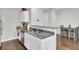 Modern kitchen with white cabinets, granite countertops, and stainless steel appliances at 128 Buchanan Cir, Goose Creek, SC 29445