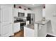 Modern kitchen with white cabinets, granite countertops, and stainless steel appliances at 128 Buchanan Cir, Goose Creek, SC 29445