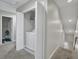 White laundry closet with washer and dryer, located in hallway at 128 Buchanan Cir, Goose Creek, SC 29445