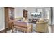 Living room with hardwood floors, comfy seating, and a large TV at 128 Buchanan Cir, Goose Creek, SC 29445