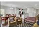 Open living and dining area with hardwood floors and couches at 128 Buchanan Cir, Goose Creek, SC 29445