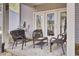 Cozy patio with wicker furniture, perfect for relaxing at 128 Buchanan Cir, Goose Creek, SC 29445