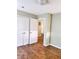 Bedroom with double doors leading to hallway at 1401 Rivers St, Walterboro, SC 29488