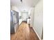 Kitchen boasts stainless steel appliances and wood-look floors at 1401 Rivers St, Walterboro, SC 29488