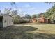 Large backyard with shed and brick home at 1439 River Front Dr, Charleston, SC 29407