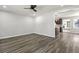 Spacious living room featuring wood-look floors and a ceiling fan at 1439 River Front Dr, Charleston, SC 29407