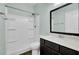 Clean bathroom with a shower/tub combo and dark brown vanity at 145 Clydesdale Cir, Summerville, SC 29486