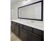 Bathroom with double vanity, mirror, and shower at 145 Clydesdale Cir, Summerville, SC 29486