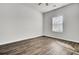 Spacious bedroom with hardwood floors and a large window at 145 Clydesdale Cir, Summerville, SC 29486