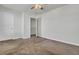 Spacious bedroom with ceiling fan and access to hallway at 145 Clydesdale Cir, Summerville, SC 29486