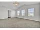 Bright bedroom with three windows and ceiling fan at 145 Clydesdale Cir, Summerville, SC 29486