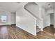 Bright entryway with hardwood floors, staircase, and access to other rooms at 145 Clydesdale Cir, Summerville, SC 29486