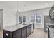 Modern kitchen featuring a large island with granite countertop and stainless steel appliances at 145 Clydesdale Cir, Summerville, SC 29486