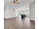 Open living room and kitchen with hardwood floors at 145 Clydesdale Cir, Summerville, SC 29486