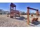 Community playground with wooden playset, swings, and slides at 145 Clydesdale Cir, Summerville, SC 29486