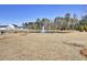 Community pond with fountain and surrounding trees at 145 Clydesdale Cir, Summerville, SC 29486