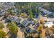 Aerial view showing homes surrounding a pond and community pool at 1493 Nautical Chart Dr, Charleston, SC 29414