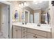 Elegant bathroom with double vanity and patterned wallpaper at 1493 Nautical Chart Dr, Charleston, SC 29414