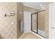 Elegant bathroom with patterned wallpaper, a large shower, and modern fixtures at 1493 Nautical Chart Dr, Charleston, SC 29414