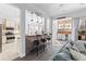 Open concept kitchen with island, stainless steel appliances, and view to living room at 1493 Nautical Chart Dr, Charleston, SC 29414