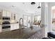 Modern kitchen with granite countertops, stainless steel appliances, and white cabinets at 1493 Nautical Chart Dr, Charleston, SC 29414