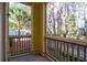 Spacious screened porch with views of lush landscaping and trees at 1600 Long Grove Dr # 1712, Mount Pleasant, SC 29464