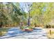 The picturesque entrance to The Preserve community, featuring a tree-lined drive at 1604 John Fenwick Ln, Johns Island, SC 29455
