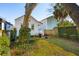 Spacious backyard with a grilling area and lush greenery at 17 H St, Charleston, SC 29403
