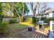 Spacious backyard with a grill and patio area at 17 H St, Charleston, SC 29403