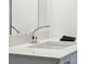 White quartz countertop bathroom sink with chrome faucet at 17 H St, Charleston, SC 29403