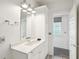 Bright bathroom with white vanity and built-in storage at 17 H St, Charleston, SC 29403