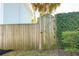 Wooden fence and gate provide privacy and access at 17 H St, Charleston, SC 29403